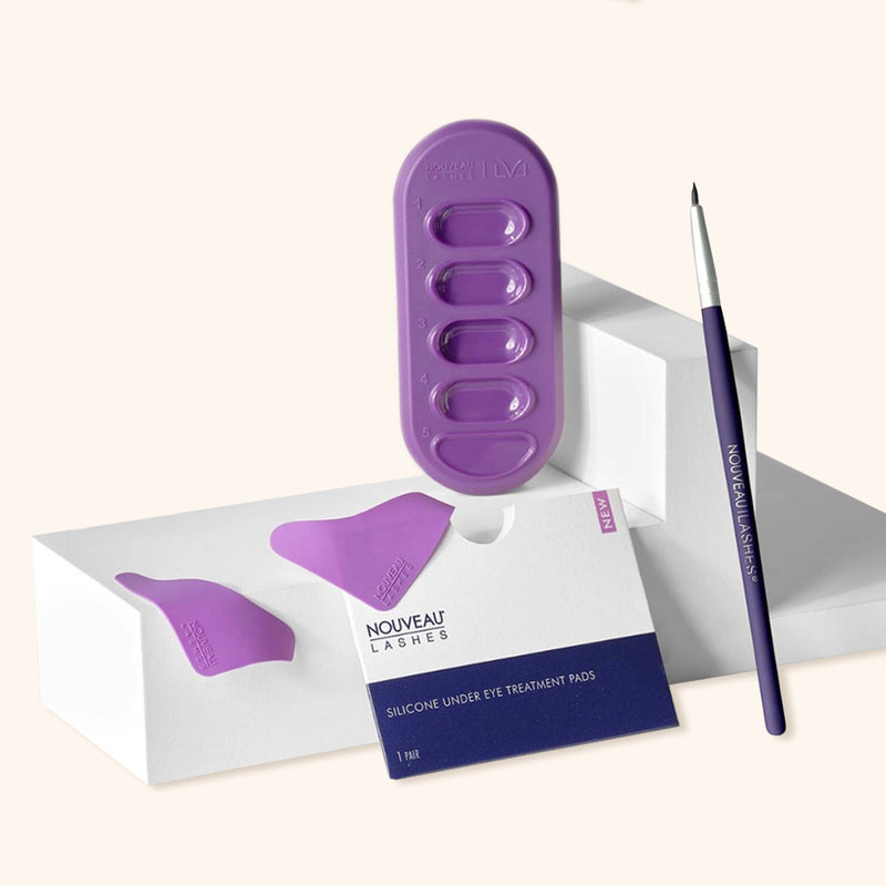 LVL Sustainable Beauty bundle with Silicone Under Eye Treatment Pads, LVL Precision Applicator, LVL Artist Palette, and Pro Lash Tool arranged neatly.