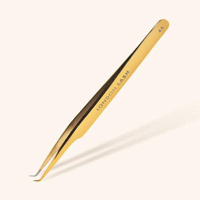 Gold lash tweezers with fiber tips for volume lash extensions