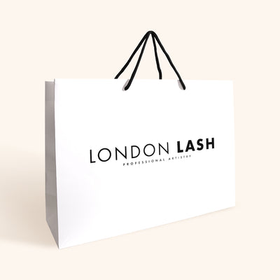 London Lash branded cardboard bag for lash supplies