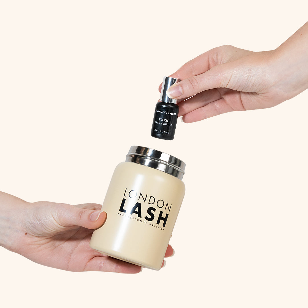 Putting lash glue in an airtight storage container 