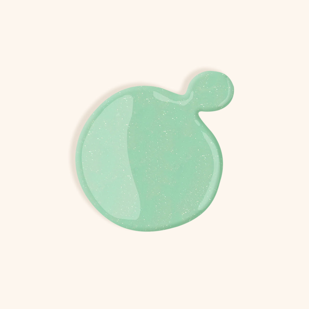 Long lasting pastel green nail polish with shimmer