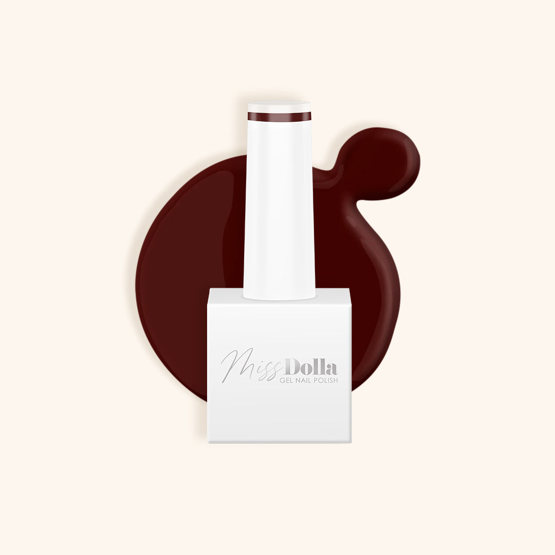 Dark red nail polish in a white bottle