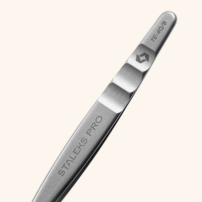 Professional eyelash tweezers in silver stainless steel