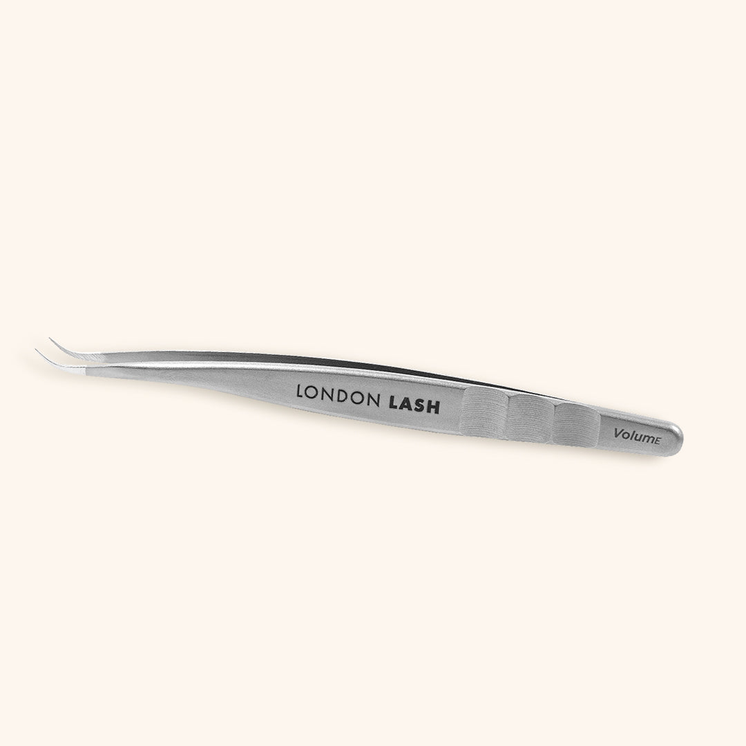 Petite lash tweezers with a curved tip 