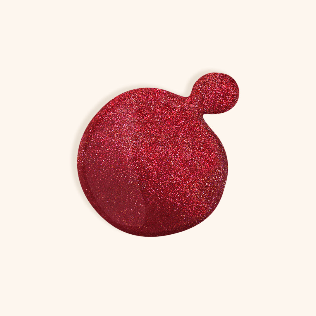 Red wine nail polish with gold shimmer