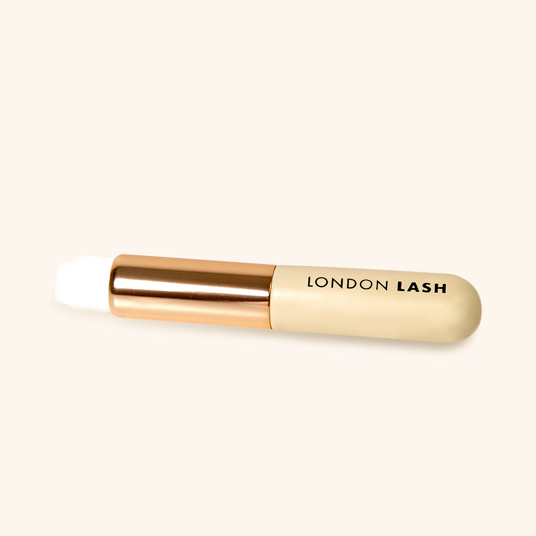 Lash Shampoo Brush by London Lash, travel size cleansing brush for lash and brow care.