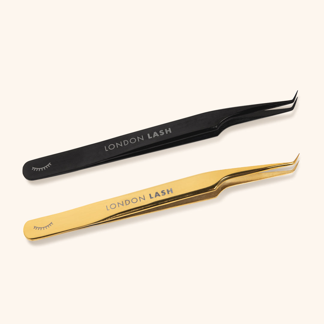 Long slim mega volume lash tweezers in gold and black