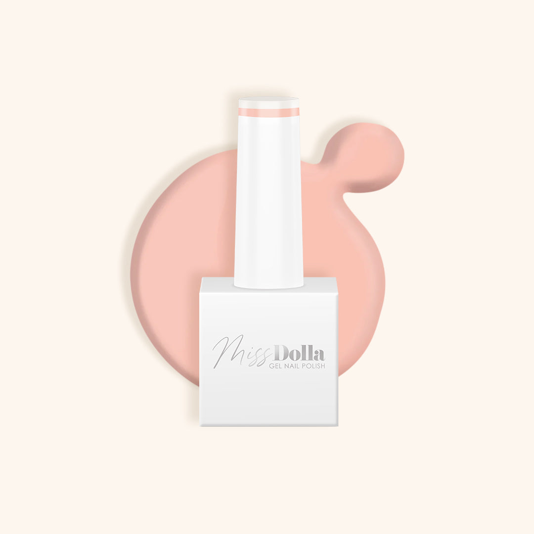 Light pastel pink gel nail polish in a white bottle