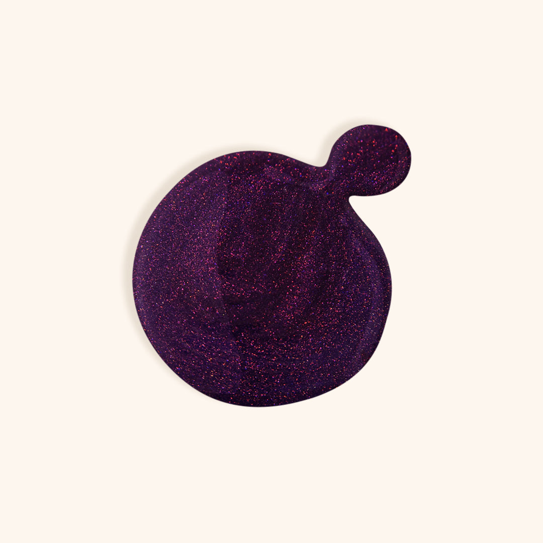 Dark purple nail polish with shimmer