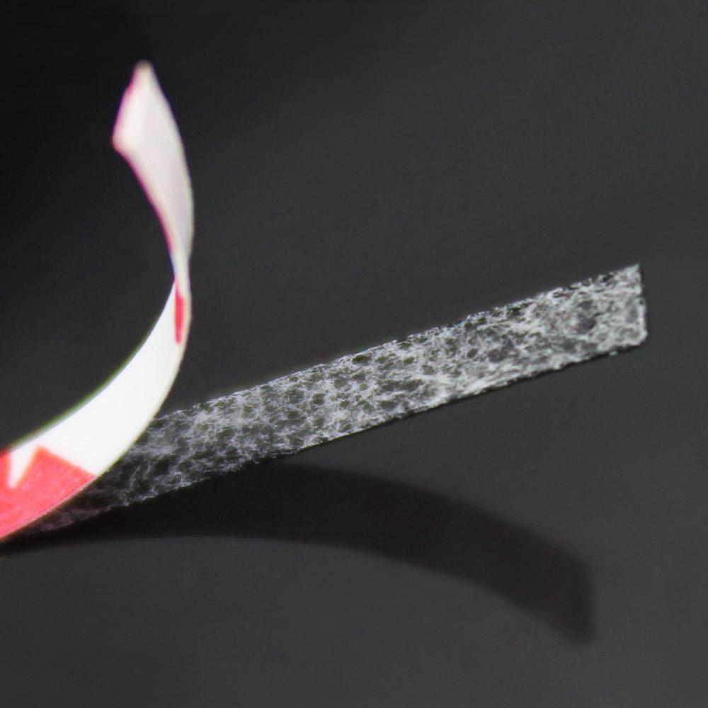 Removing the paper from double sided lash tape for lash extensions